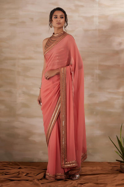 Peach Metal Stud Saree Indian Clothing in Denver, CO, Aurora, CO, Boulder, CO, Fort Collins, CO, Colorado Springs, CO, Parker, CO, Highlands Ranch, CO, Cherry Creek, CO, Centennial, CO, and Longmont, CO. NATIONWIDE SHIPPING USA- India Fashion X