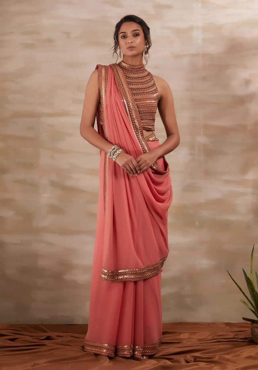 Peach Metal Stud Saree Indian Clothing in Denver, CO, Aurora, CO, Boulder, CO, Fort Collins, CO, Colorado Springs, CO, Parker, CO, Highlands Ranch, CO, Cherry Creek, CO, Centennial, CO, and Longmont, CO. NATIONWIDE SHIPPING USA- India Fashion X