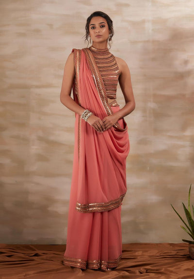 Peach Metal Stud Saree Indian Clothing in Denver, CO, Aurora, CO, Boulder, CO, Fort Collins, CO, Colorado Springs, CO, Parker, CO, Highlands Ranch, CO, Cherry Creek, CO, Centennial, CO, and Longmont, CO. NATIONWIDE SHIPPING USA- India Fashion X