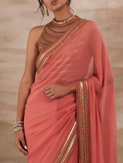 Peach Metal Stud Saree Indian Clothing in Denver, CO, Aurora, CO, Boulder, CO, Fort Collins, CO, Colorado Springs, CO, Parker, CO, Highlands Ranch, CO, Cherry Creek, CO, Centennial, CO, and Longmont, CO. NATIONWIDE SHIPPING USA- India Fashion X