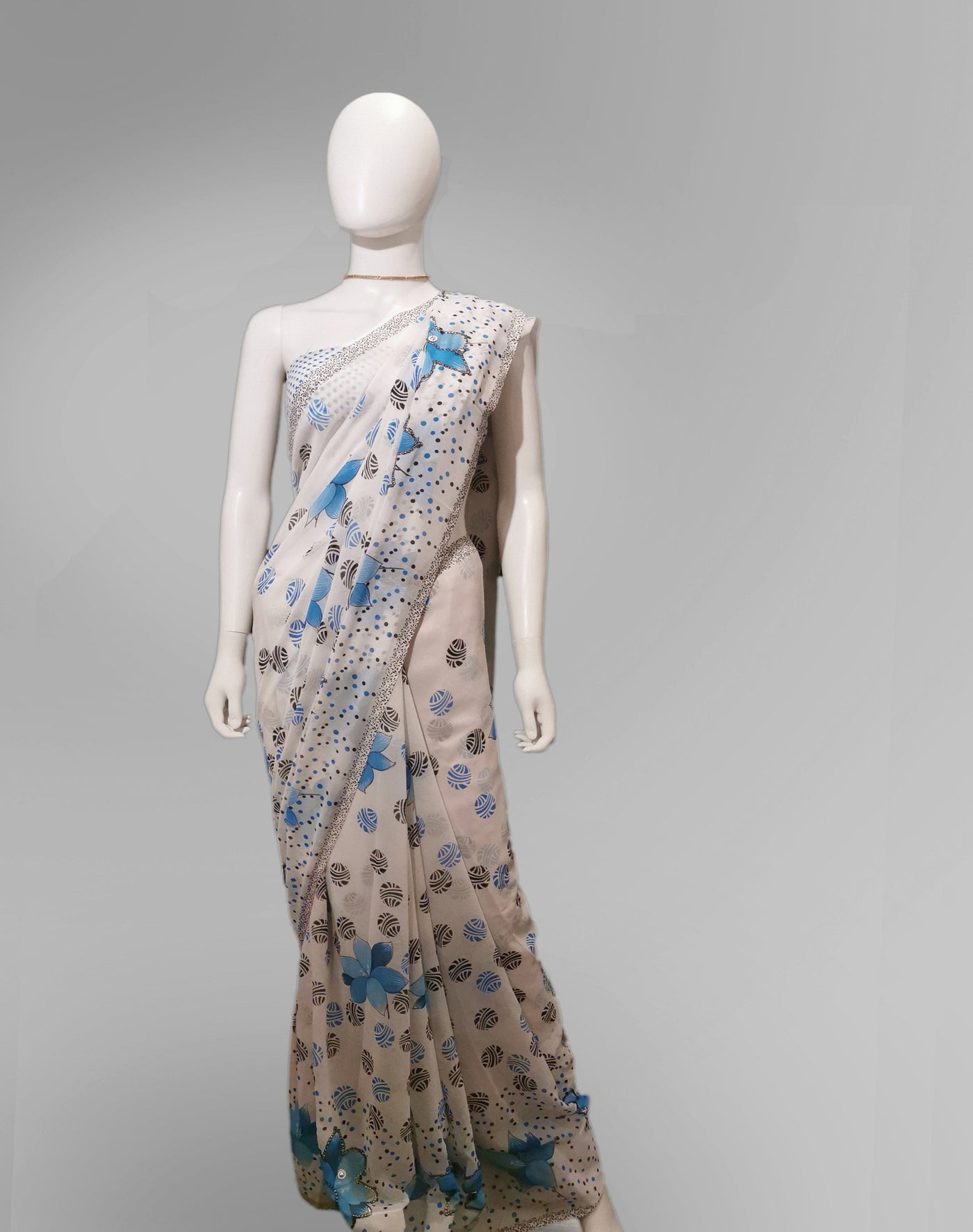 Saree in White and Blue Floral Featured with Sequin Work Indian Clothing in Denver, CO, Aurora, CO, Boulder, CO, Fort Collins, CO, Colorado Springs, CO, Parker, CO, Highlands Ranch, CO, Cherry Creek, CO, Centennial, CO, and Longmont, CO. NATIONWIDE SHIPPING USA- India Fashion X