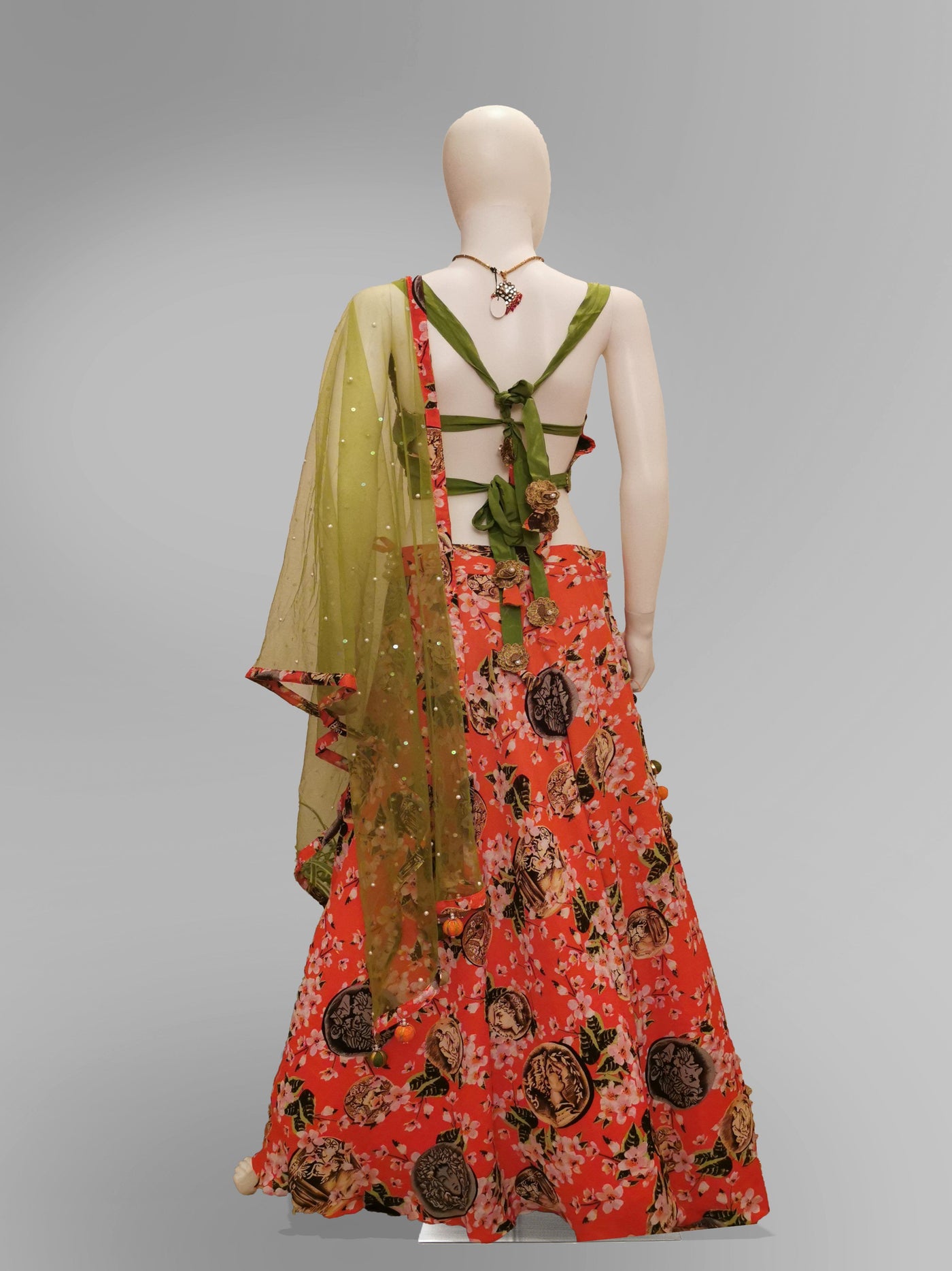 Lehenga in Coral Pink in Floral Motif and Green Strap Blouse - Indian Clothing in Denver, CO, Aurora, CO, Boulder, CO, Fort Collins, CO, Colorado Springs, CO, Parker, CO, Highlands Ranch, CO, Cherry Creek, CO, Centennial, CO, and Longmont, CO. Nationwide shipping USA - India Fashion X