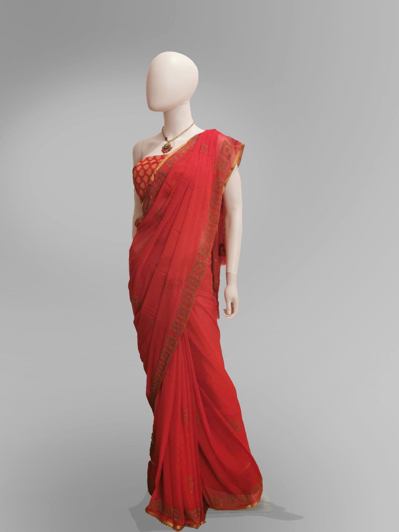 Saree in Fiery Red With Subtle Golden Embroidery Indian Clothing in Denver, CO, Aurora, CO, Boulder, CO, Fort Collins, CO, Colorado Springs, CO, Parker, CO, Highlands Ranch, CO, Cherry Creek, CO, Centennial, CO, and Longmont, CO. NATIONWIDE SHIPPING USA- India Fashion X